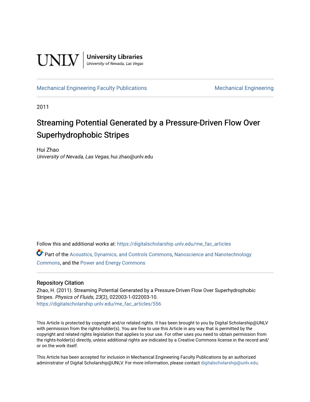 Streaming Potential Generated by a Pressure-Driven Flow Over Superhydrophobic Stripes