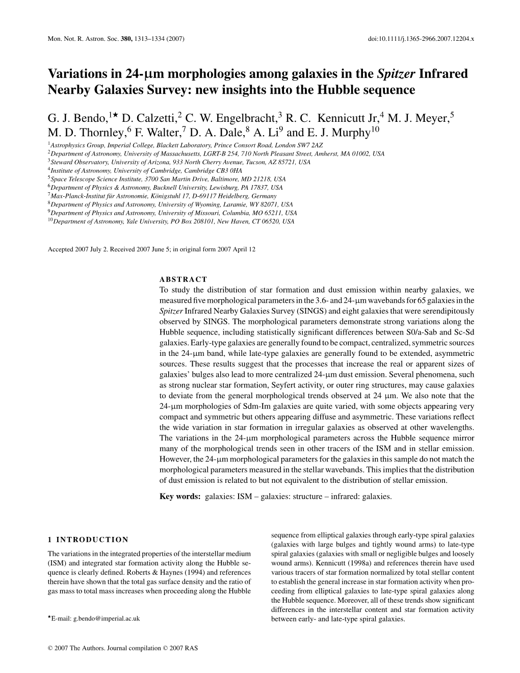 Variations in 24-Μm Morphologies Among Galaxies in the Spitzer Infrared Nearby Galaxies Survey: New Insights Into the Hubble Sequence