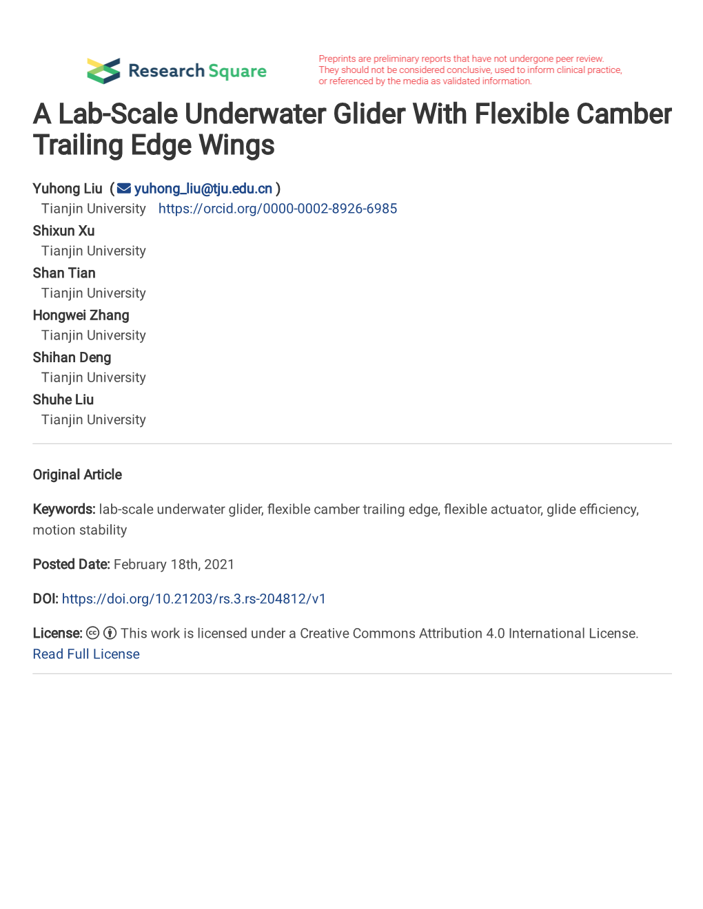 A Lab-Scale Underwater Glider with Flexible Camber Trailing Edge Wings