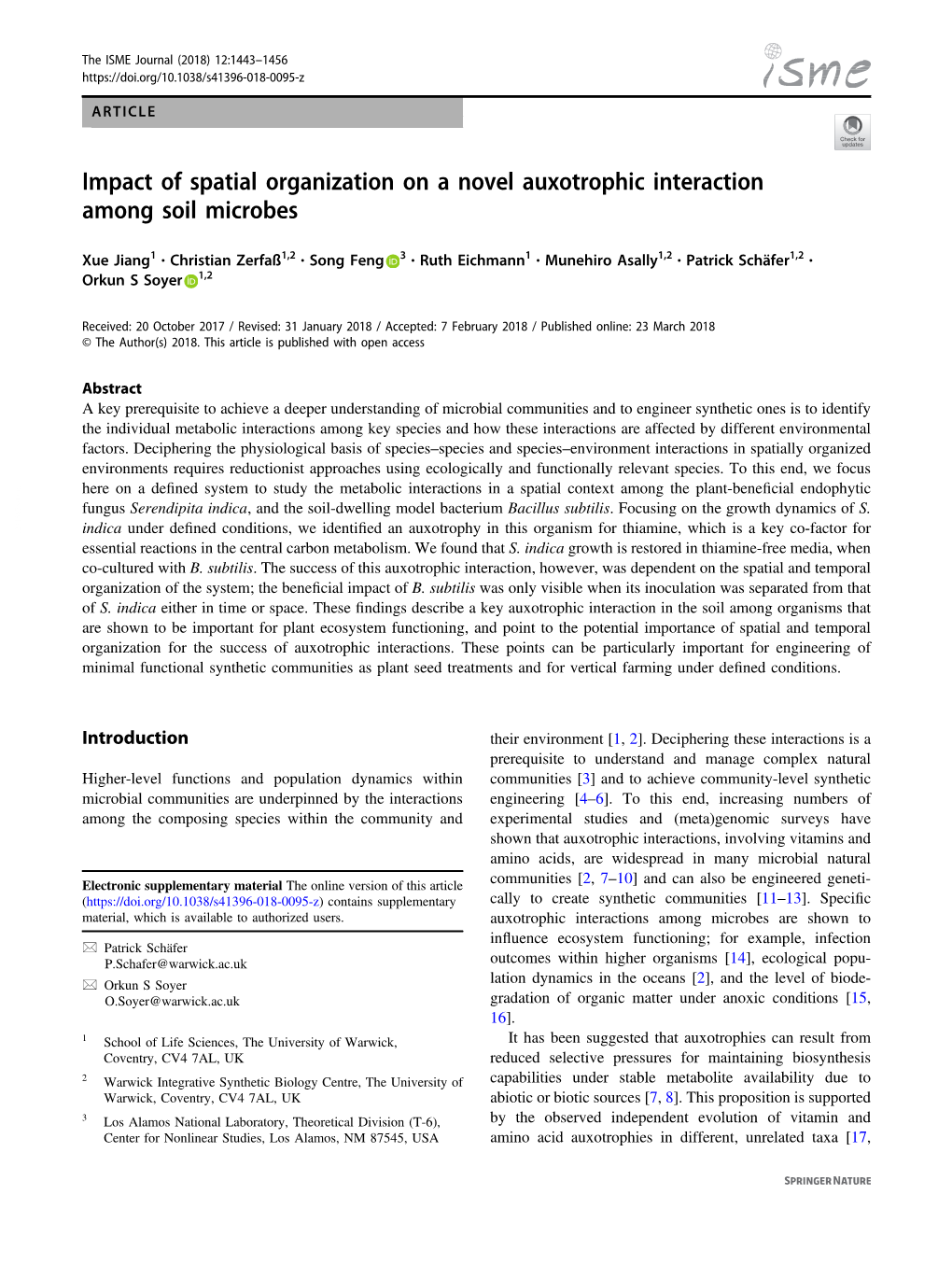 Impact of Spatial Organization on a Novel Auxotrophic Interaction Among Soil Microbes