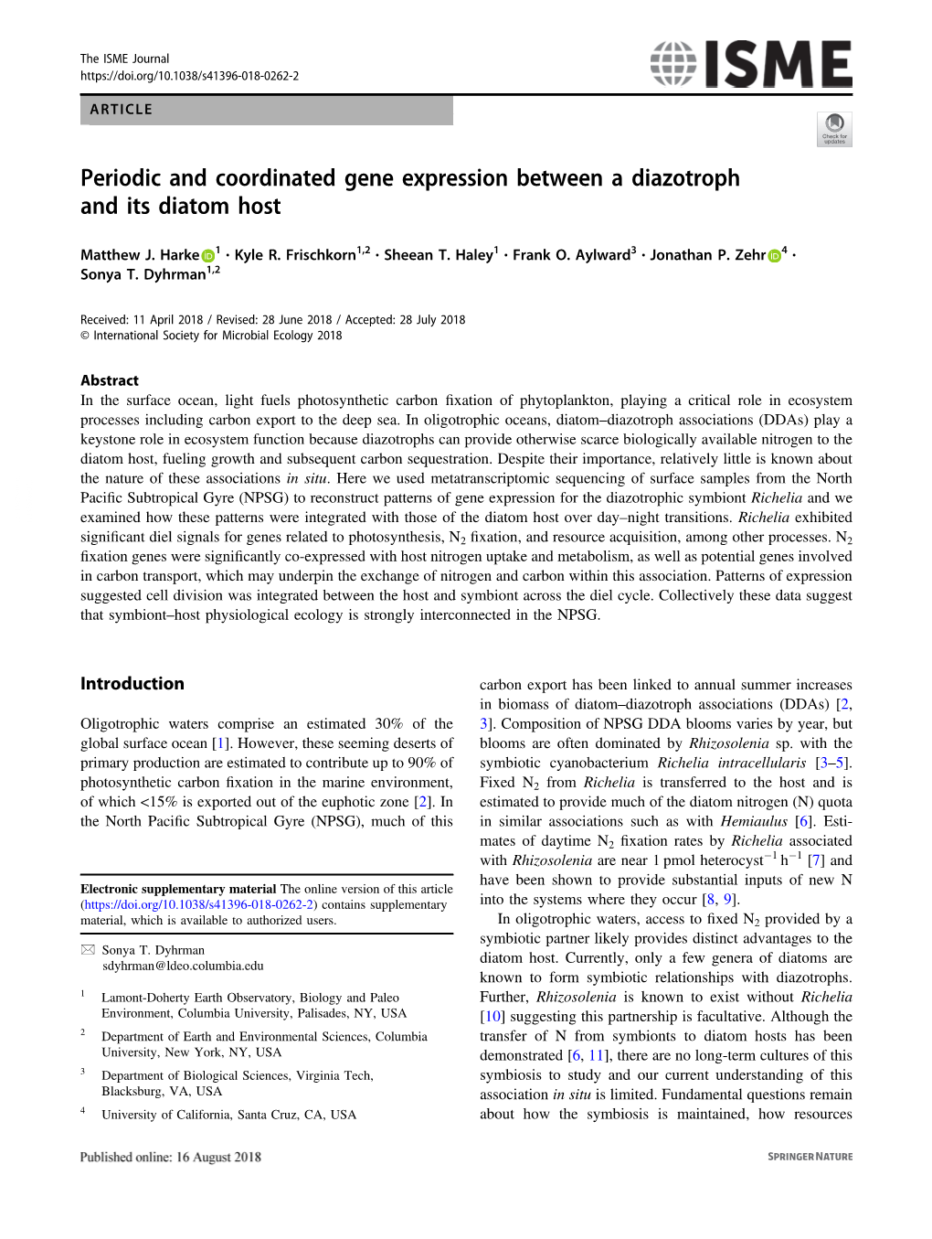 Periodic and Coordinated Gene Expression Between a Diazotroph and Its Diatom Host